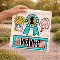 Fair trio popcorn, prize ribbon and cotton candy with name plate girl